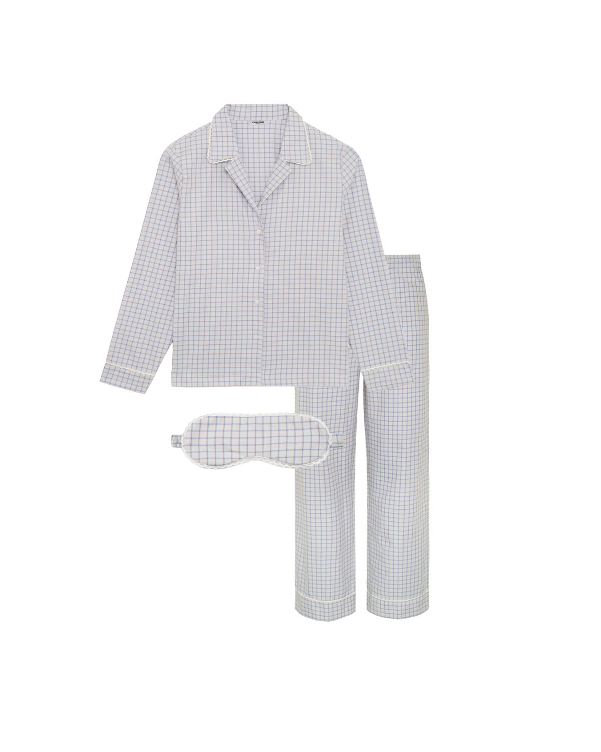 Checkered pajama set with matching eye mask on a white background