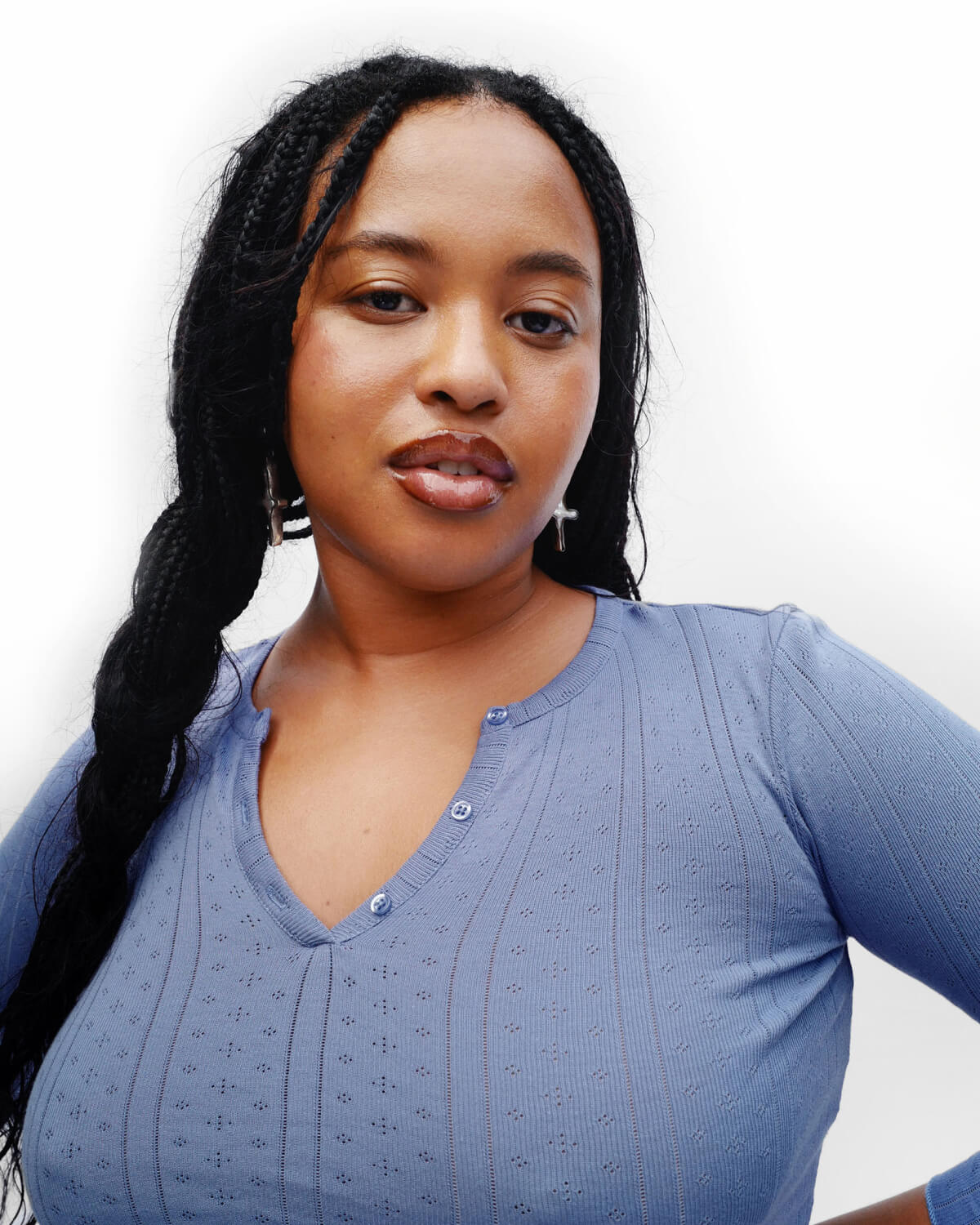 Woman wearing a blue shirt against a white background