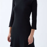 Black dress with long sleeves on a white background