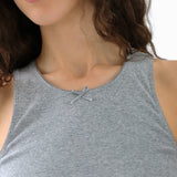 Gray tank top worn by a person with a neutral background