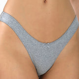 Gray briefs being worn on a plain background