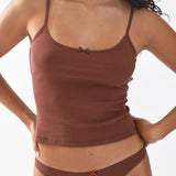 Brown tank top and underwear set on a plain background
