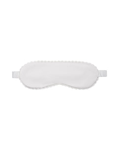 White sleep mask on a white background