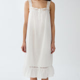 White nightgown with lace details on a white background
