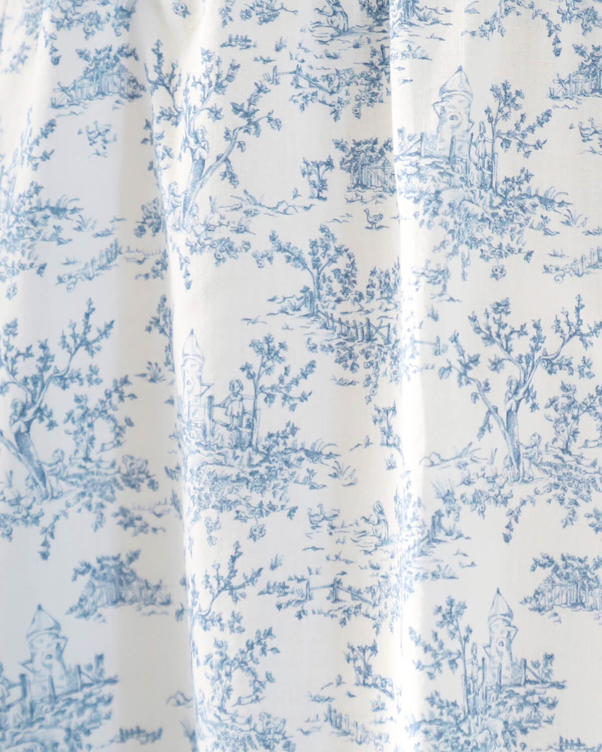 White fabric with blue floral pattern
