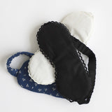 Set of eye mask and headband on a white background