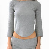 Gray long-sleeve top and shorts set on a white background Flat Shot