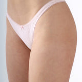 Light pink thong on a plain background