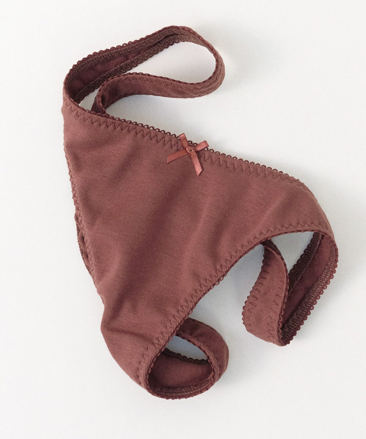 Brown thong a white background