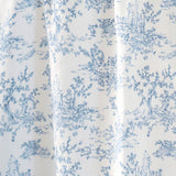 White fabric with blue floral pattern