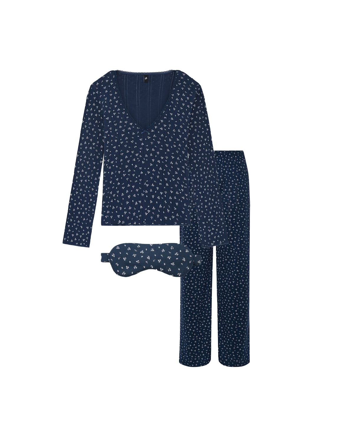 Navy blue pajama set with white floral pattern on a white background